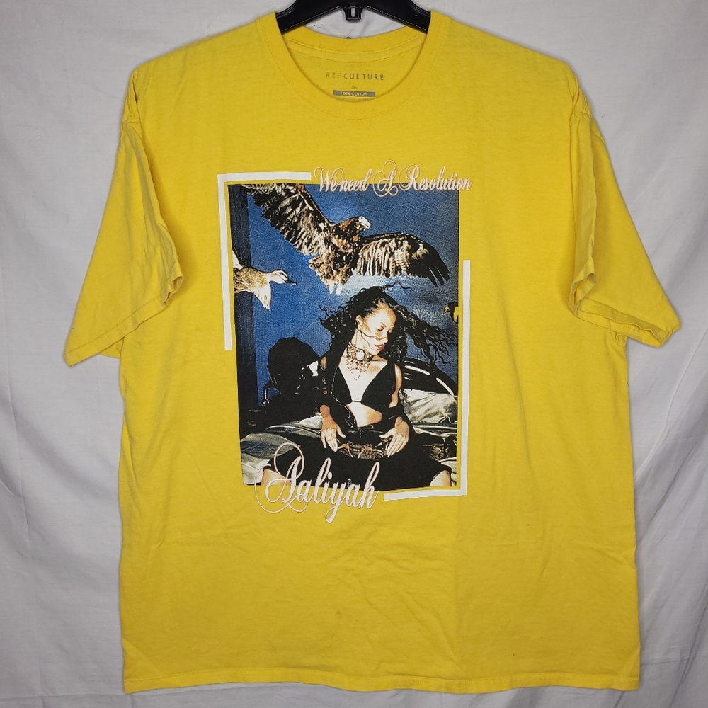 AALIYAH "We Need A Resolution" Men's Yellow Short Sleeve Graphic Tee 2XL